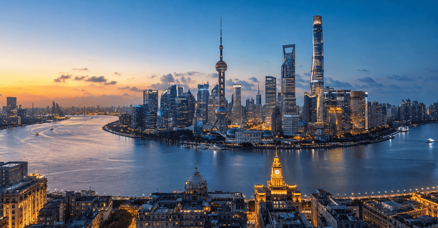 The Bund and Lujiazui skyline across the Huangpu River at blue hour